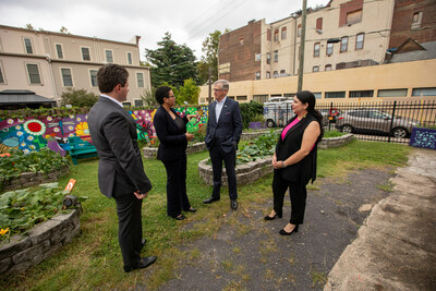 Leaders from Truist and National Association for Latino Community Asset Builders (NALCAB) tour the Norris Square Community Alliance Garden after announcing Truist Foundation donated $1.2 million to NALCAB to help advance economic mobility in communities in Philadelphia and beyond on Friday, Aug. 25, 2023. (Pictured L-R: Jeremy Ben-Zev, Philadelphia market president, Truist; Michelle Carrera, executive director, Norris Square Community Alliance; Bill Rogers, chairman and CEO, Truist Financial; Al