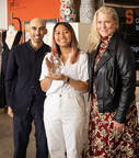 Syracuse University fashion design student Nina Chen (center) wowed judges, Zahir Babvani (left) and Supermodel Emme (right), with her innovative “Tulip Dress” design.