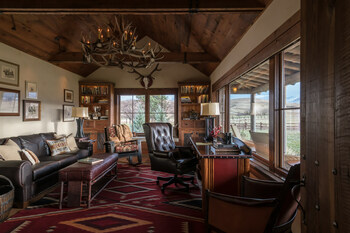 A Kibler & Kirch-designed Wyoming home office includes burnished leather, barnwood and Native rugs contributing to a sense of place and Young’s emphasis on authenticity (PC: Audrey Hall).