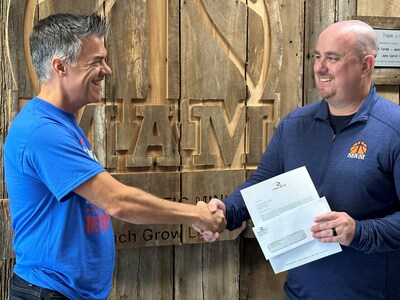 Radians employee Kevin Schon nominated Memphis Athletic Ministries (MAM) as a Tickets for Charity contender due to the nonprofit’s positive impact on Memphis youth. Schon, pictured left, was all smiles when he hand-delivered the check to MAM Chief Development Officer, Brian McCurry.