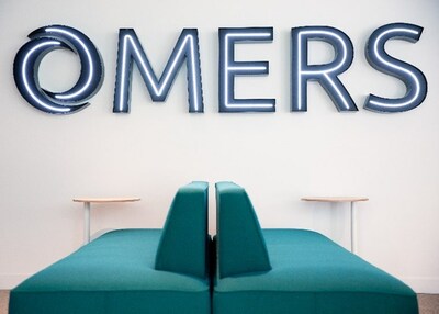OMERS logo in an office setting.