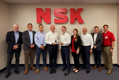 Motion and NSK officers at the award presentation, L-R: David Tassi and Andrew Pelletier (NSK); Chris Brewer (Motion); Tarek Bugaighis (NSK); Joe Limbaugh, Julie Knight and Robert Anaforian (Motion); Taylor Bond (NSK); and Alan Cripps (Motion).