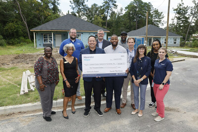 (left to right) Natalyn Bates-Morris, board member, Annette Ogletree-McDogual, vice chairman, Coastal Empire Habitat for Humanity, Chris Schimek, general manager, Hyundai of Savannah, Brandon Ramirez, director, corporate social responsibility, David Archer, senior manager, Aftersales Operations, Hyundai Motor America, Zerik Samples, chief executive officer, Dwayne Stephens, board member, Kirk Gilbert, board chairman, Jennifer Roach, board member, Coastal Empire Habitat for Humanity, Cherisa Pelle, Hyundai Motor America, Bianca Johnson, Hyundai Motor Group Metaplant America, LLC (HMGMA), in Savannah, Ga. on August 29, 2023. (Photo/Hyundai)