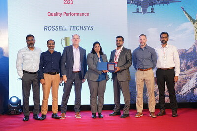 Rossell Techsys receiving Supplier Excellence Award for Quality (PRNewsfoto/Rossell Techsys)