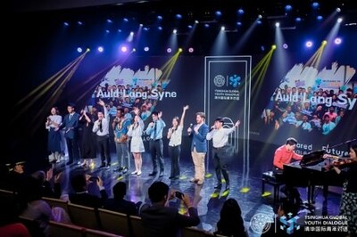 Students from Tsinghua and youth representatives performs a chorus of 