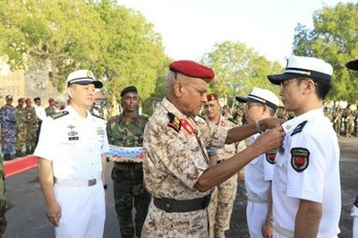 Then Chief of General Staff of Djibouti Armed Forces Zakaria Cheikh Ibrahim awards Independence Day Medals to 10 Chinese medical team members of the PLA support base in Djibouti, Jan. 16, 2020. (Photo by Tan Longlong) 