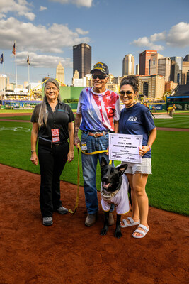 Lea Kinneman (right), Co-Owner of Bully Max Premium Dog Food is pictured with Carol Boden (left), Founder and CEO of Guardian Angels Medical Service Dogs, Medical Service Dog, Bucco, and his recipient, at PNC Park.