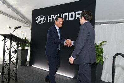Jose Munoz, President and CEO, Hyundai and Genesis Motor North America handshake with State of Michigan Representative Jason Morgan at Hyundai Safety Test & Investigation Laboratory Ribbon Cutting Ceremony.