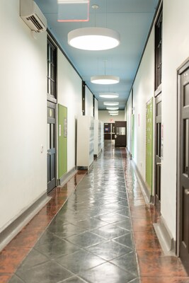 Renovated school hallway with original woodwork
