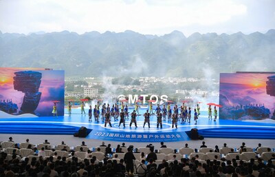 The opening ceremony of the 2023 International Conference of Mountain Tourism and Outdoor Sports, or MTOS, in Xingyi city on Saturday. [Photo provided to chinadaily.com.cn]