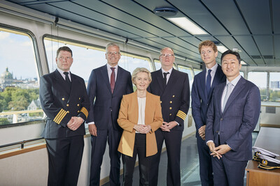 After the naming ceremony of Laura Maersk, HD Hyundai CEO Kisun Chung (first from the right), Maersk Chairman Robert Maersk Uggla (second from the right), and Ursula Von Der Leyen, President of the European Commission (center), are taking a commemorative photo in the ship's cabin.