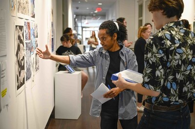 Associate Professor of Art Abraham Abebe consults with a student at Georgia College & State University.