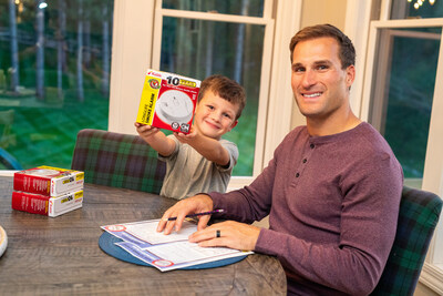Quarterback Kirk Cousins and son develop a fire escape plan together as part of Kidde's Cause For Alarm™ campaign. The initiative was developed to teach children and parents about the importance of having working smoke alarms and practicing fire safety at home. PHOTO CREDIT: Justin Cox Photography