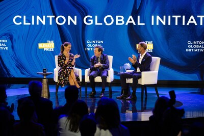 Michael J. Fox receives the Elevate Prize Catalyst Award in honor of his contributions to Parkinson’s research and advocacy from the Elevate Prize Foundation’s CEO Carolina García Jayaram (left) and its founder Joseph Deitch (right) during the Clinton Global Initiative 2023 Meeting.