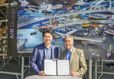 Korean Air's Chairman and CEO, Walter Cho, poses with the President and CEO of the California Science Center, Jeffrey Rudolph, at the site of the future Samuel Oschin Air and Space Center.