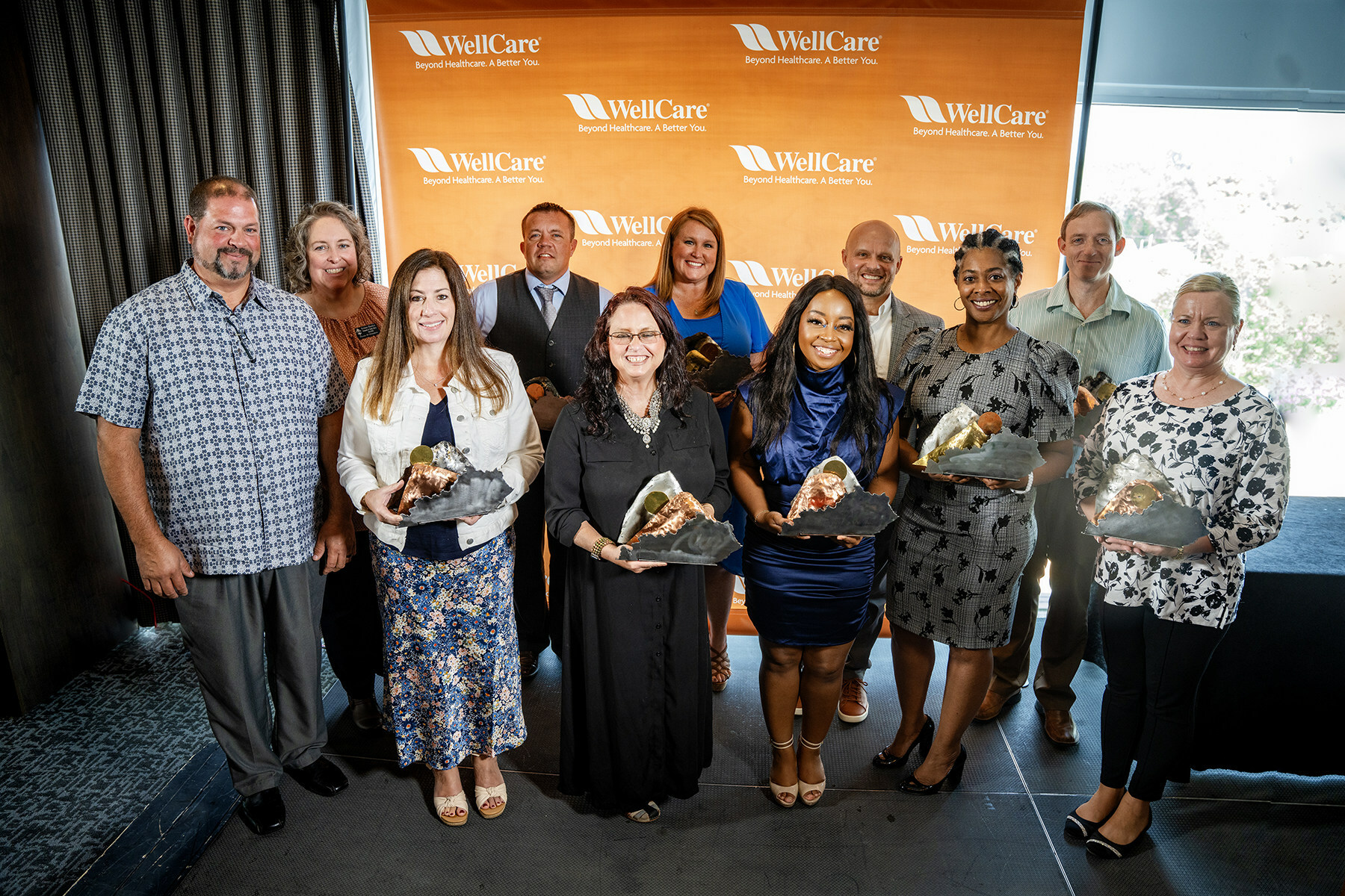 Congratulations to the 2023 award winners of WellCare of Kentucky’s Fourth Annual Community Health Champions Awards:  Front row: Matt & Jennifer Westwood (Region 6), Chelsea Ryann’s Festival of Hope; Christy Hinton (Region 2), RiverValley Behavioral Health; Faith Fountain (Region 7), Ramey-Estep Regroup; Sonja Grey (Region 3), Exploited Children’s Help Organization (ECHO); Stacy Kuhn (Region 4), Farmstead, Inc.; Back row: Katina Hayden (Overall Winner), Catholic Charities of Owensboro; Dustin Bowman (Region 5), Frankfort Police Department; Tiffany Riley (Region 1), Kentucky Care; Corey Ewing, WellCare Plan President; Dr. Key Douthitt (Region 8), Breathitt County Long Term Recovery.