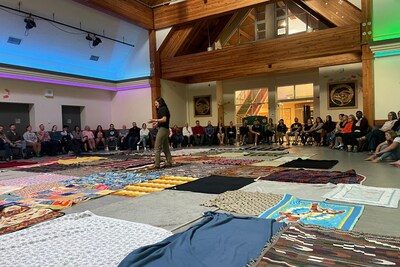 Educators and staff at the newly named qathet School District participate in a Blanket Ceremony to build understanding about shared history as Indigenous and non-Indigenous peoples in Canada as part of their professional development day last week. (CNW Group/SD 47 - Powell River Board of Education)