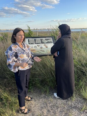 Terri Carta, Executive Director, Jamaica Bay-Rockaway Parks Conservancy and Maitha Al Hameli, Section Head, Marine Biodiversity Assessment and Conservation, Environment Agency - Abu Dhabi exchange ideas about mangrove restoration projects in New York and Abu Dhabi.