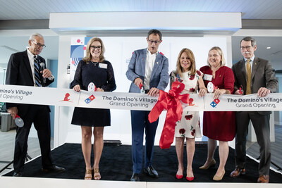 Pictured from left to right: Richard C. Shadyac Jr. – president and CEO of ALSAC, the fundraising and awareness organization for St. Jude Children’s Research Hospital; Paula Head – senior director of patient family outreach for ALSAC; Russell Weiner – Domino’s CEO; Marlo Thomas – St. Jude national outreach director; Jenny Fouracre-Petko – Domino’s senior director of communications; and Dr. James Downing – president and CEO of St. Jude “slice” the ribbon at the grand opening of The Domino’s Village in Memphis, Tennessee, on Sept. 27, 2023.