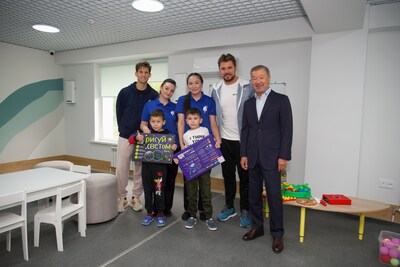 Dominic Thiem, social workers with children, Stan Wawrinka, and Bulat Utemuratov - Photo credit: The Kazakhstan Tennis Federation