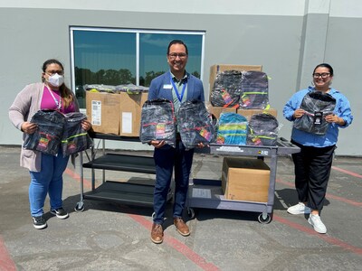 SchoolsFirst Federal Credit Union drops off a backpack donation at Los Angeles County Office of Education.