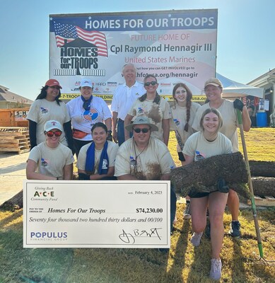 Populus Financial Group employees volunteer for Homes For Our Troops during Marine Corporal Raymond Hennagir’s Volunteer Day (PRNewsfoto/Populus Financial Group Inc.)