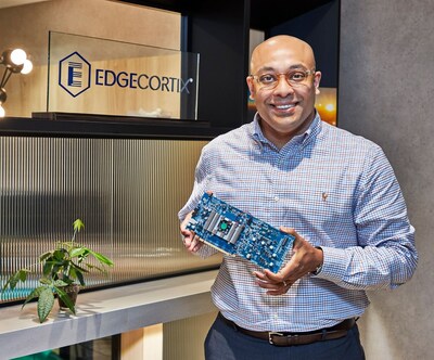 EdgeCortix Founder and CEO Dr. Sakyasingha Dasgupta holds a board equipped with the company's proprietary SAKURA-I AI Processor