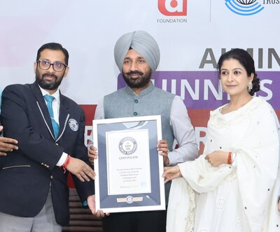 Chancellor Chandigarh University & CWT Founder Satnam Singh Sandhu receiving the record certificate from Guinness World Records officials for Largest Distribution of Sanitary Products in 24 hours