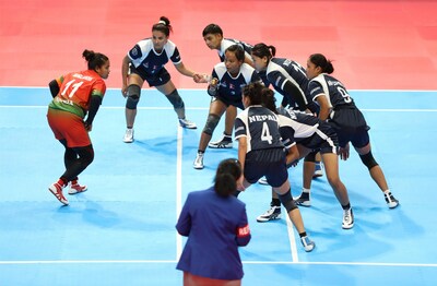Photo shows a women's kabaddi game between Nepal and Bangladesh at the 19th Asian Games in Hangzhou, east China's Zhejiang province, Oct. 2, 2023. (Photo by Han Xiaoming/People's Daily)