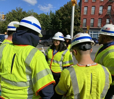 Leela, center, takes over the role of President for National Grid - NY and meets with workers in New York City.