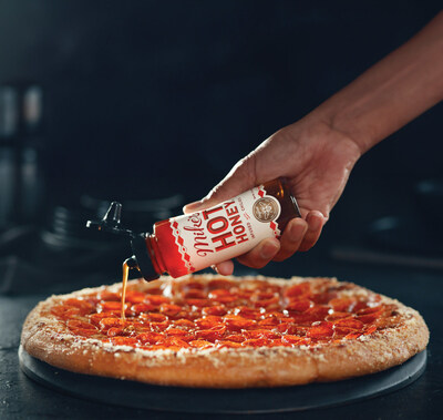 Marco’s Pizza and Mike’s Hot Honey team up to create the NEW Hot Honey Magnifico Pizza.