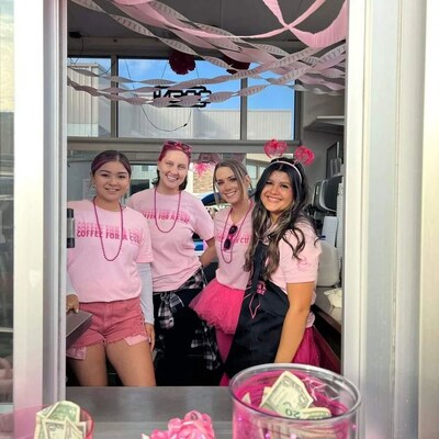 The Human Bean baristas celebrating last year's Coffee for a Cure Giveback Day.