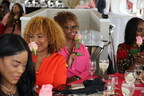 Arise And Shine brunch attendees receive flowers. Photo credit: Aliya Dyson
