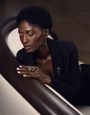 Model wearing Eggplant Earrings, Money Brooch and Catamando Ring by Castro NYC