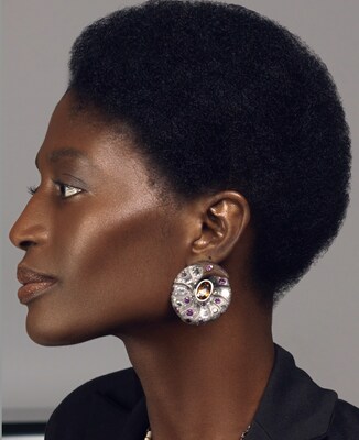 Model wearing the Croissant Earrings by Castro NYC
