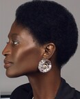 Model wearing the Croissant Earrings by Castro NYC
