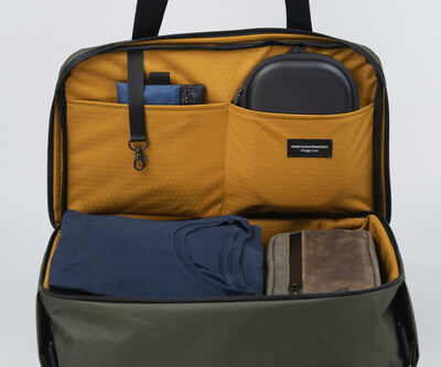 Spacious main compartment with two pockets, key tether, and two compression straps