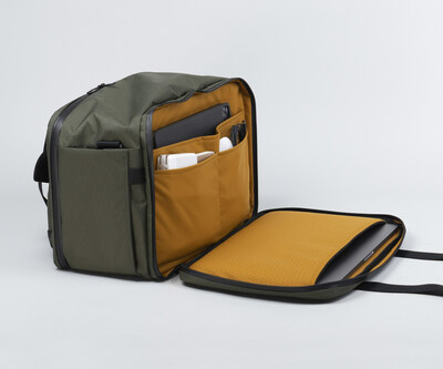 TSA-friendly office compartment with built-in padded laptop sleeve, tablet pocket, and organizational pockets