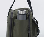 Expandable side pockets hold up to 3.5-inch diameter water bottle
