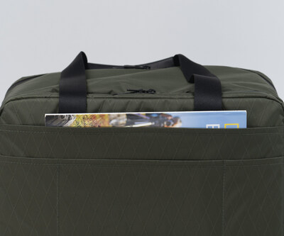 Full-length back pocket holds magazines, files, etc.