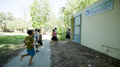 Children run to a mobile bomb shelter provided by The International Fellowship of Christians and Jews (The Fellowship) in Kibbutz Alumim, Gaza Strip in August 2023. The Fellowship has placed thousands of bomb shelters throughout Israel in recent years, and will place additional shelters as part of its Operation Iron Swords emergency aid response. (Photo: ©2023 IFCJ/Buksa Inc.)