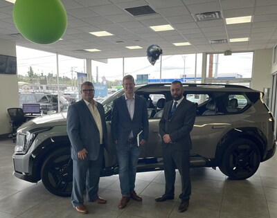 Pictured: Matthew Phillips, CEO of Car Pros Automotive Group, Congressman Derek Kilmer, Tod Vartaneian, General Manager Car Pros Kia Tacoma