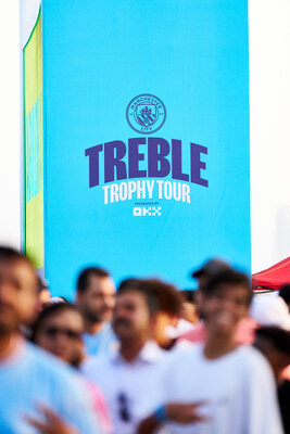 Attendees arrive at the MCFC Treble Trophy Tour, Presented by OKX, in Abu Dhabi.