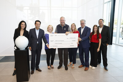 (left to right) Claudia Marquez, chief operating officer, Genesis Motor North America, Jos Muoz, president and CEO, Genesis Motor North America, Liz Jaworski, chief leadership officer, Ron Jaworski, CEO, Trish Cuadrado, executive director, Jaws Youth Playbook, Peter Lanzavecchia, president/owner, Genesis of Cherry Hill, Skylar Calvello, Jaws Youth Playbook, Brandon Ramirez, director, corporate social responsibility, Genesis Motor America in Cherry Hill, N.J. on October 5, 2023 (Photo/Genesis)