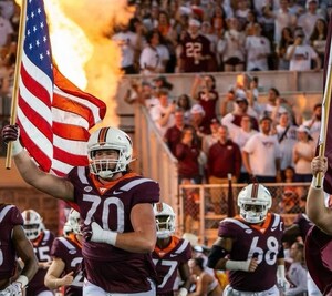 VIRGINIA TECH LINEMEN ARE FIRST TEAMMATES TO WEAR SAFR HELMET COVERS IN GAME