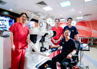 Professor Koichi Suda and Professor Ichiro Uyama from Fujita Health University with Dr Kim Guowei and Professor Jimmy So (seated) from the National University Hospital and National University of Singapore.