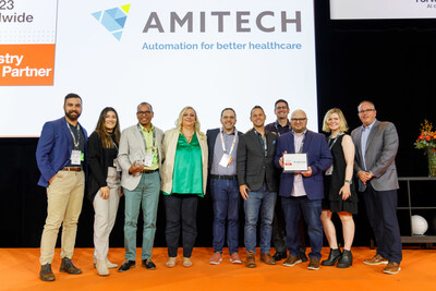 Amitech team receiving UiPath's 2023 Worldwide Partner of the Year Award on stage at Forward VI