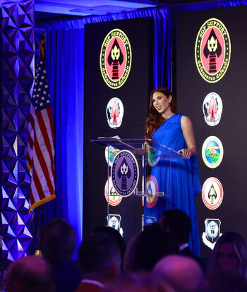 SOF Support Chair Dominique Plewes addresses the audience during the 2023 Del Mar Country Club Golf Tournament and Dinner-Gala. The event raised more than $1.4 million for SOF Support.