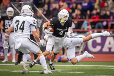 Linfield University WR Colton Smith brings in a pass against George Fox University. The Wildcats secured their 67th consecutive winning season against the rival Bruins at Linfield's 2023 Homecoming game.