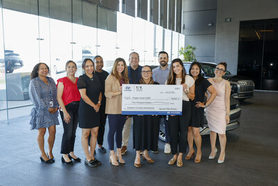 Members of Hyundai's Employee Resource Group, Amigos Unidos, with Martha Madrid, associate director, Project Youth OCBF in Fountain Valley, Calif., July 20, 2023. (Photo/Hyundai)